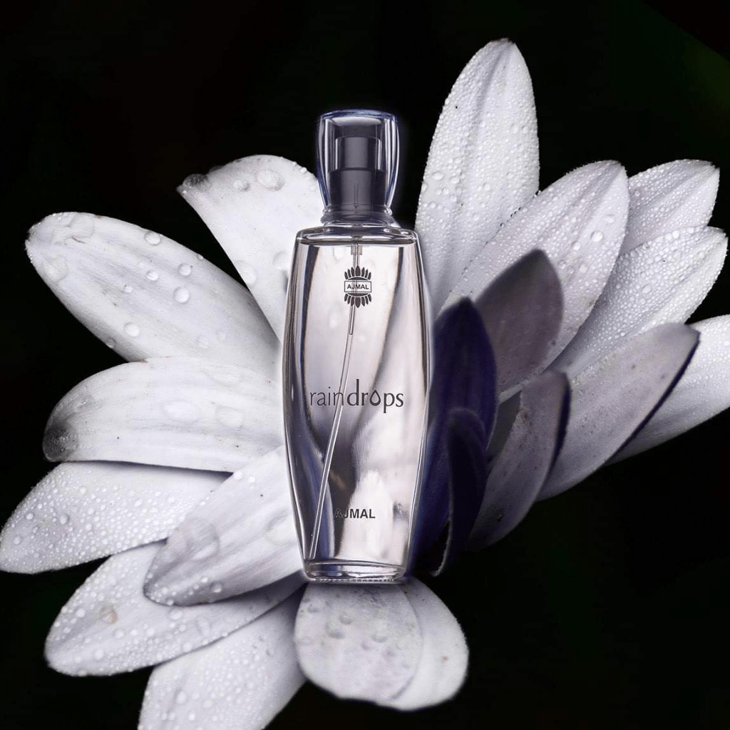 Ajmal Raindrop for Women Eau De Parfum 50ml bottle, elegant fragrance bottle with floral design and silver accents.