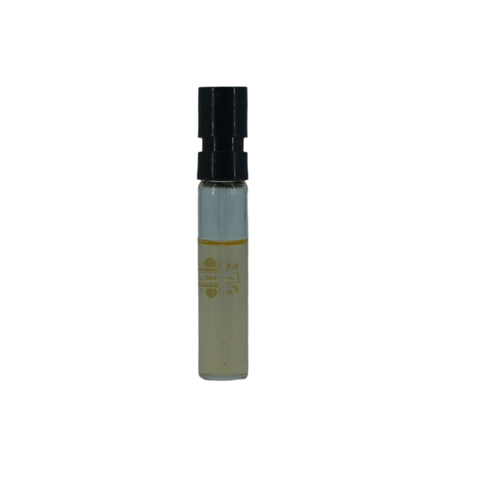 Ajmal Shadow Eau De Parfum 1ml sample bottle with black and gold label showing the fragrance inside.