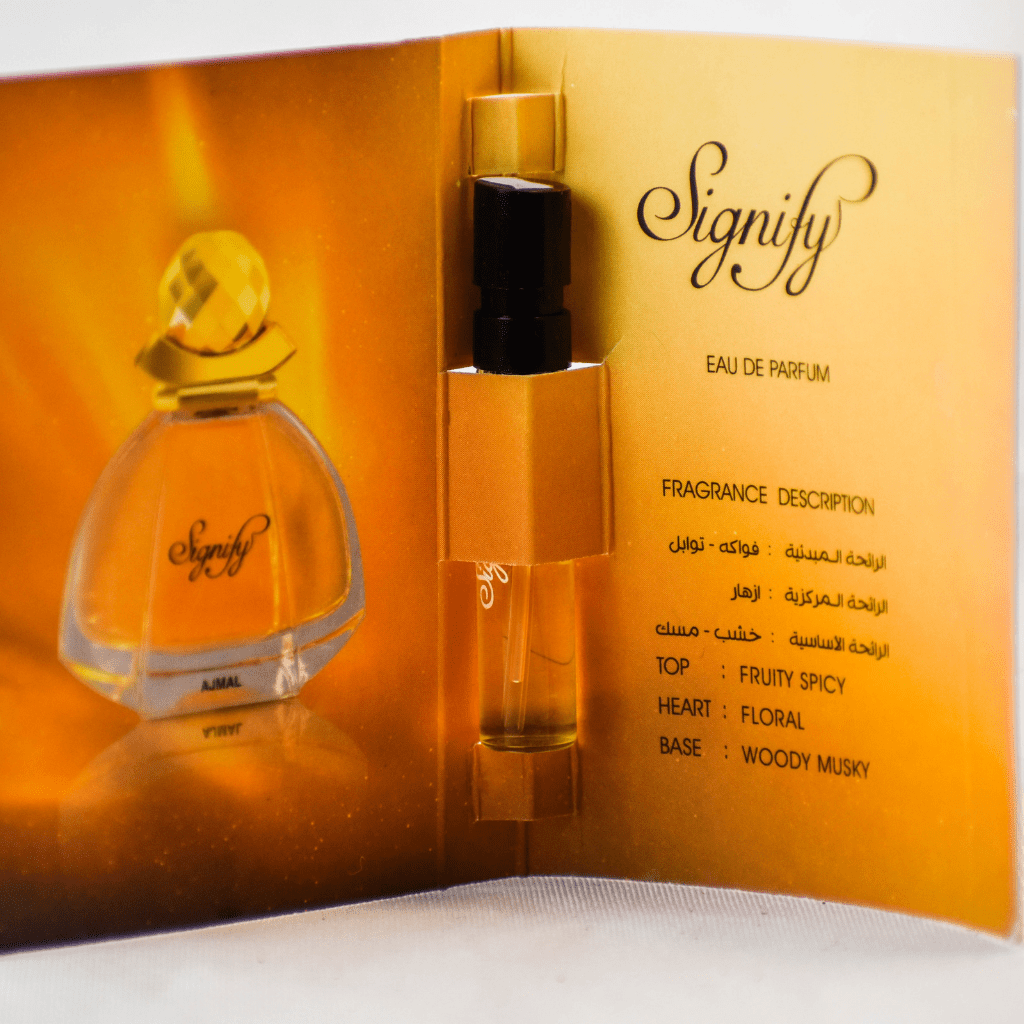 Ajmal Signify EDP sample for women in a 1ml vial with label, showcasing the fragrance sample packaging.