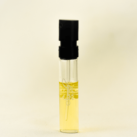 Ajmal Signify EDP sample for women in a 1ml vial, featuring a label with fragrance details and branding.