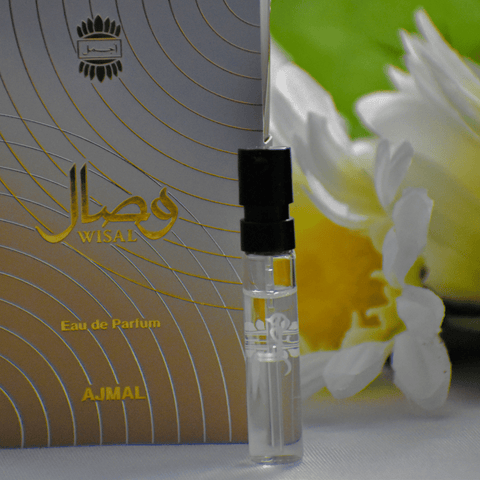 Ajmal Wisal EDP sample for women, 1ml perfume vial, showcasing the small fragrance sample with elegant packaging.