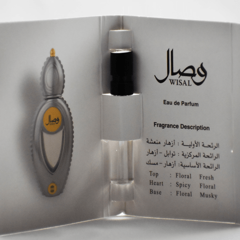 Ajmal Wisal EDP sample for women in a clear glass 1ml vial, showcasing the small perfume sample container.