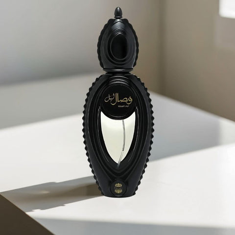 Wisal Layl EDP spray by Ajmal, 50ML, featuring a luxurious long-lasting fragrance bottle with elegant packaging.