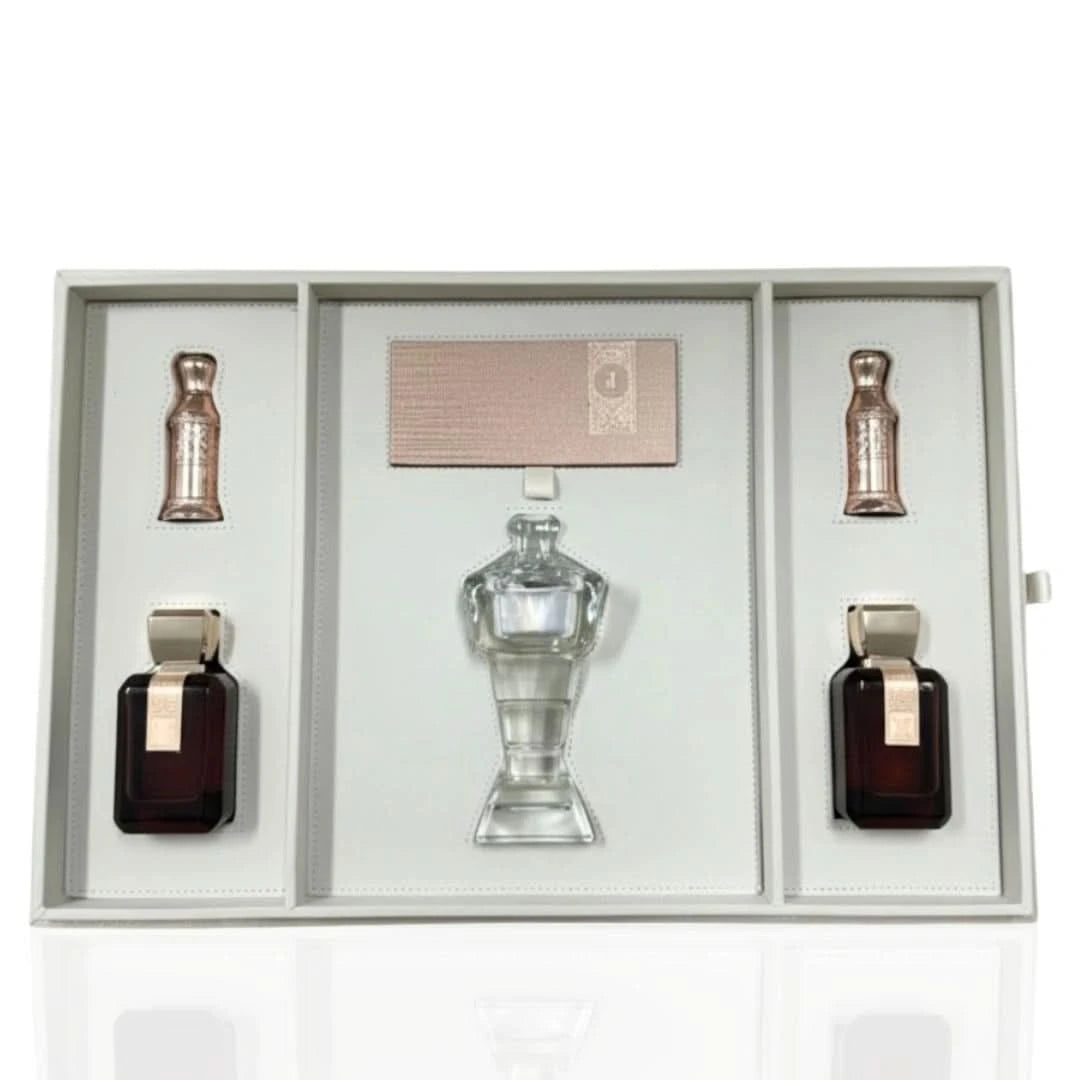 Arabian Oud Al Arabiya Brown Collection 5-piece gift set with perfumes and accessories, elegant packaging and rich fragrance.