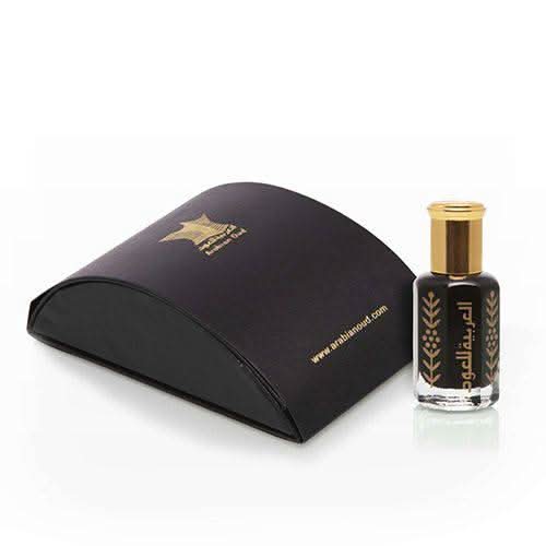 Arabian Oud Al Hajar Al Aswad loose perfume oil in a 6ml bottle with a gold cap, showcasing its rich, dark concentrate.
