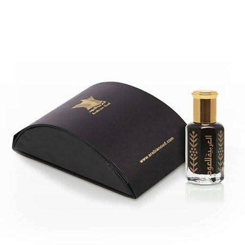 Arabian Oud Al Hajar Al Aswad loose perfume oil in a 6ml bottle with a gold cap, showcasing its rich, dark concentrate.