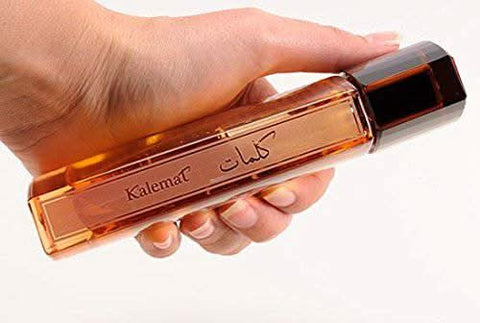 Arabian Oud Kalemat Brown Eau De Parfum 100ml bottle, elegant design, showcasing the luxurious fragrance and branding of Arabian Oud.