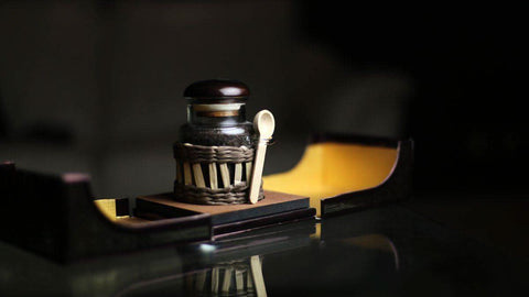Arabian Oud Majoon Al Arabian Mutawar Bakhoor incense container with wood chips for aromatic burning and home fragrance.