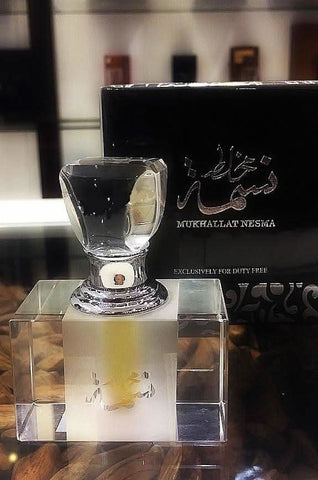Arabian Oud Mukhallat Nesma perfume oil for women, 6ml, concentrated perfume oil with floral and oriental fragrance, in a small glass bottle.