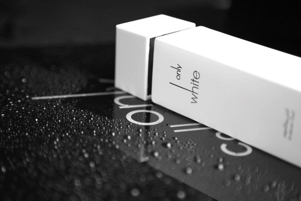 Arabian Oud Only White Eau De Parfum 100ml bottle, elegant design, showcasing the luxurious fragrance packaging.