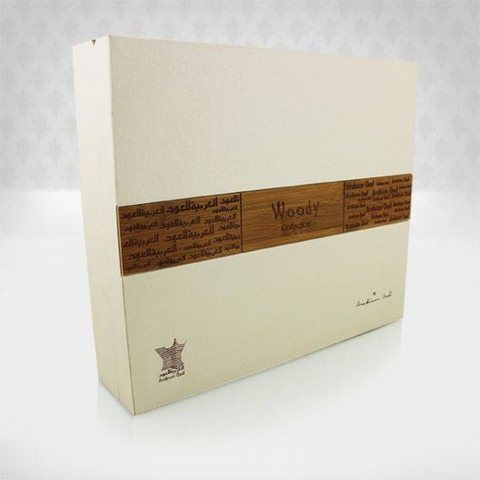 Arabian Oud Woody Collection EDP 50ml perfume gift set with bottles and decorative box, elegant fragrance presentation.