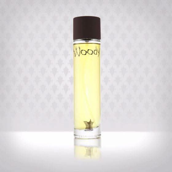Arabian Oud Woody EDP 100ml bottle, Eau De Parfum with woody fragrance, elegant glass perfume bottle, luxurious scent display