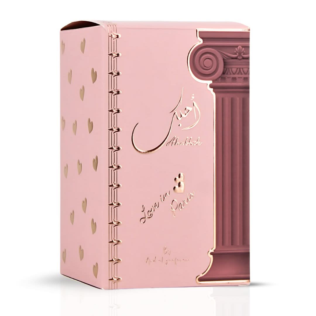 Ahubbak Love In Paris Eau de Parfum spray by Ard Al Zaafaran, 100ml bottle, elegant perfume bottle with floral design.