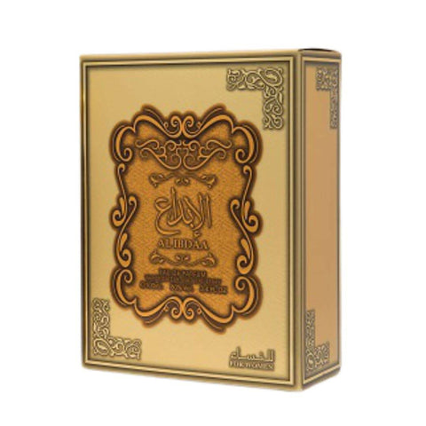 Elegant bottle of Ard Al Zaafaran Al Ibdaa Gold EDP for Women, 100mL, showcasing luxurious perfume packaging and design.