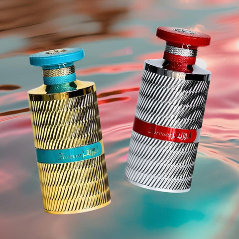 Bundle of Ard Al Zaafaran Forever Gold and Silver Eau de Parfum sprays, 100ml bottles, featuring luxurious fragrance bottles.