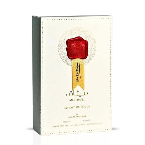 Ard Al Zaafaran Meethaq Extrait De Rouge Eau de Parfum spray 100ml bottle with elegant design and branding.
