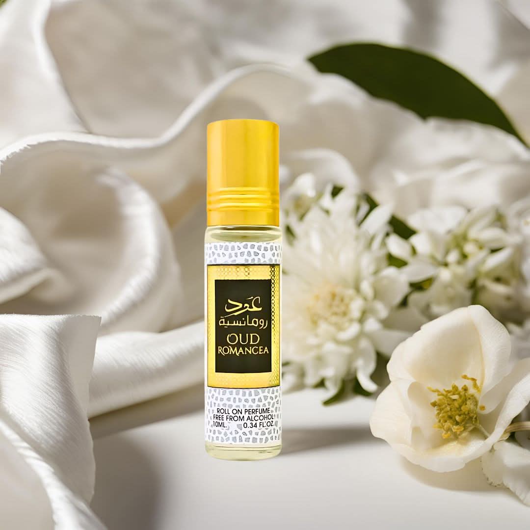 Three 10ml amber bottles of Oud Romancea perfume oil by Ard Al Zaafaran, concentrated CPO with elegant packaging.