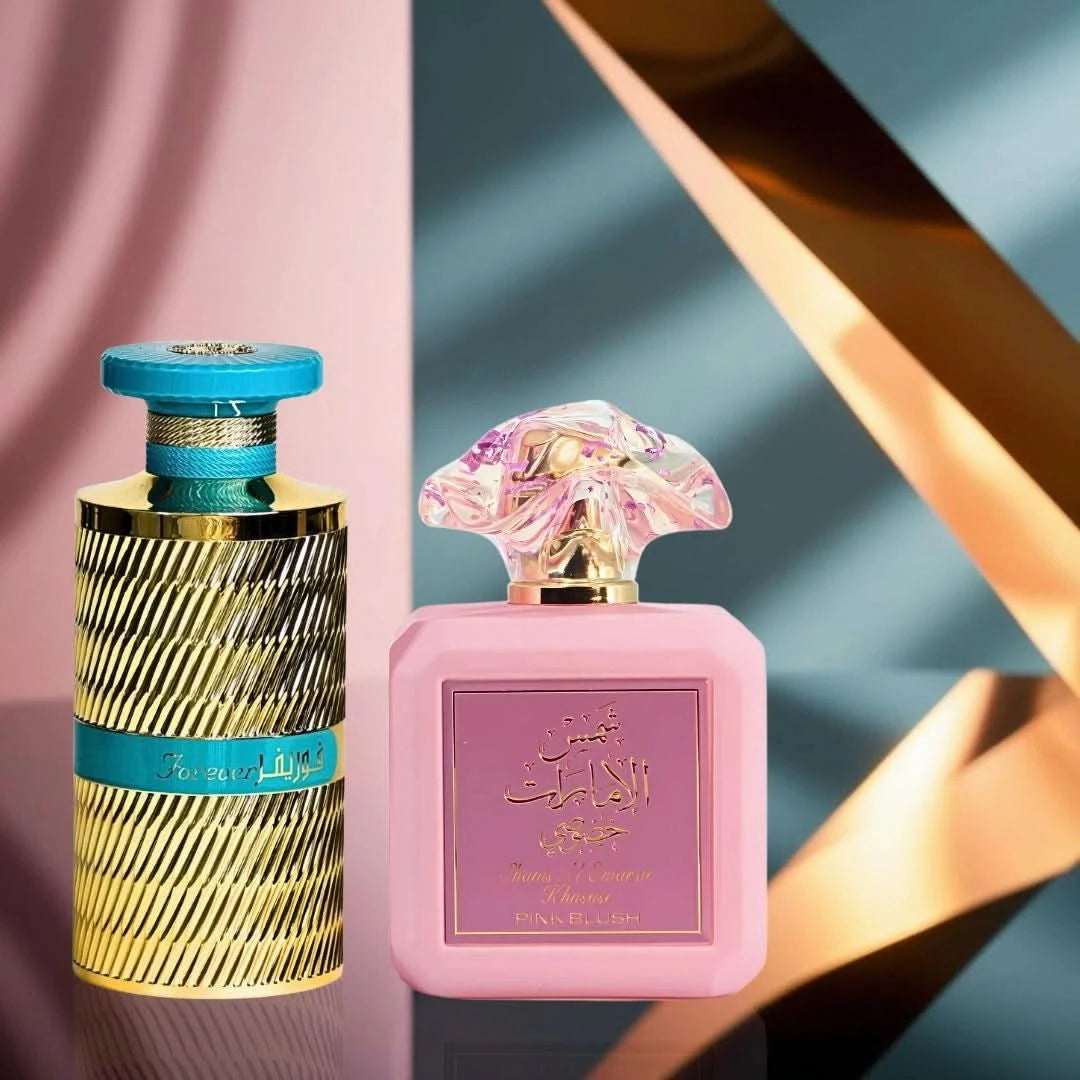 Bundle of Ard Al Zaafaran Pink Blush and Forever Gold Eau de Parfum sprays in pink and gold packaging, 100ml each.