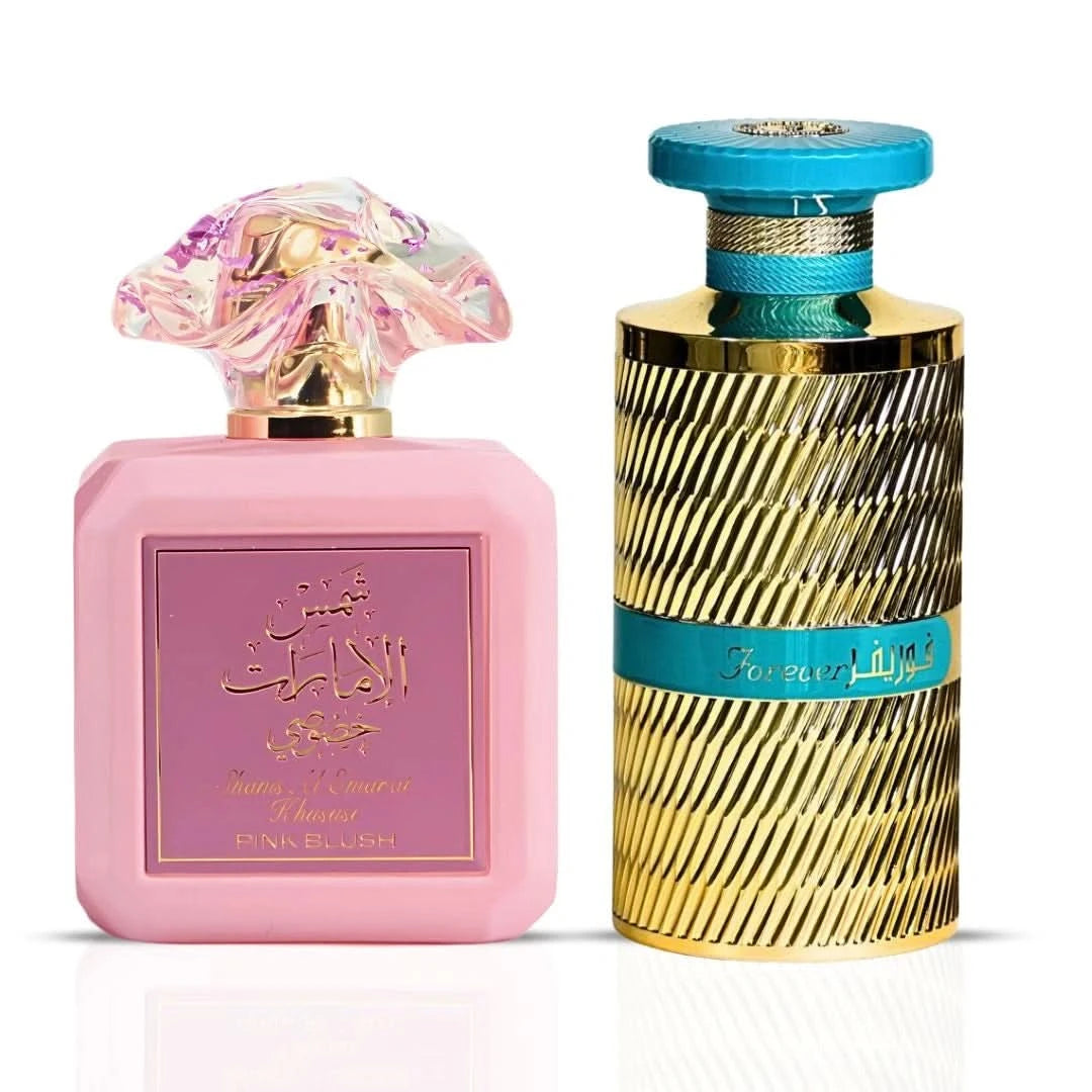 Bundle of two Ard Al Zaafaran Eau de Parfum sprays, Pink Blush and Forever Gold, 100ml each, featuring elegant perfume bottles.