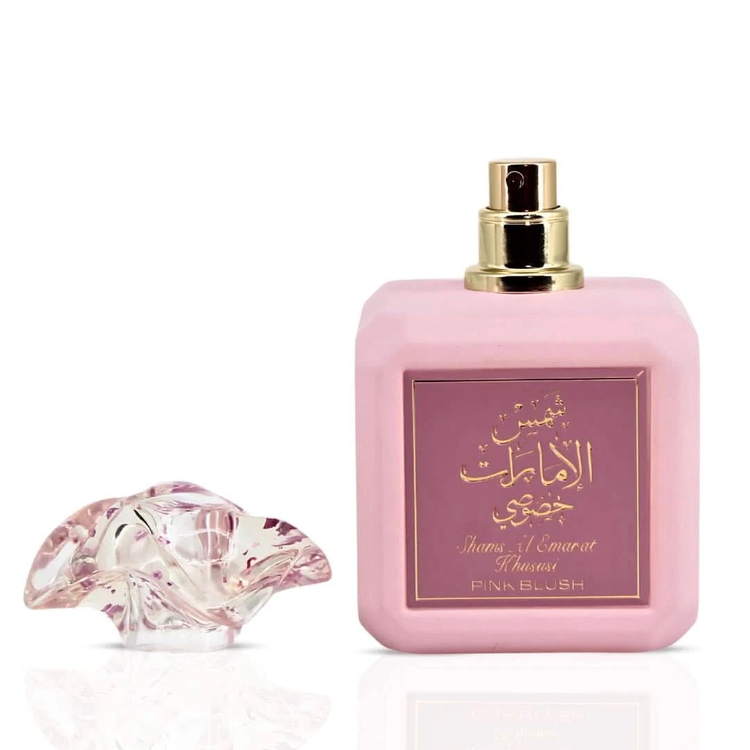 Pink Blush Shams Al Emarat Khususi Eau de Parfum spray by Ard Al Zaafaran, 100ml bottle, elegant pink packaging and floral design.