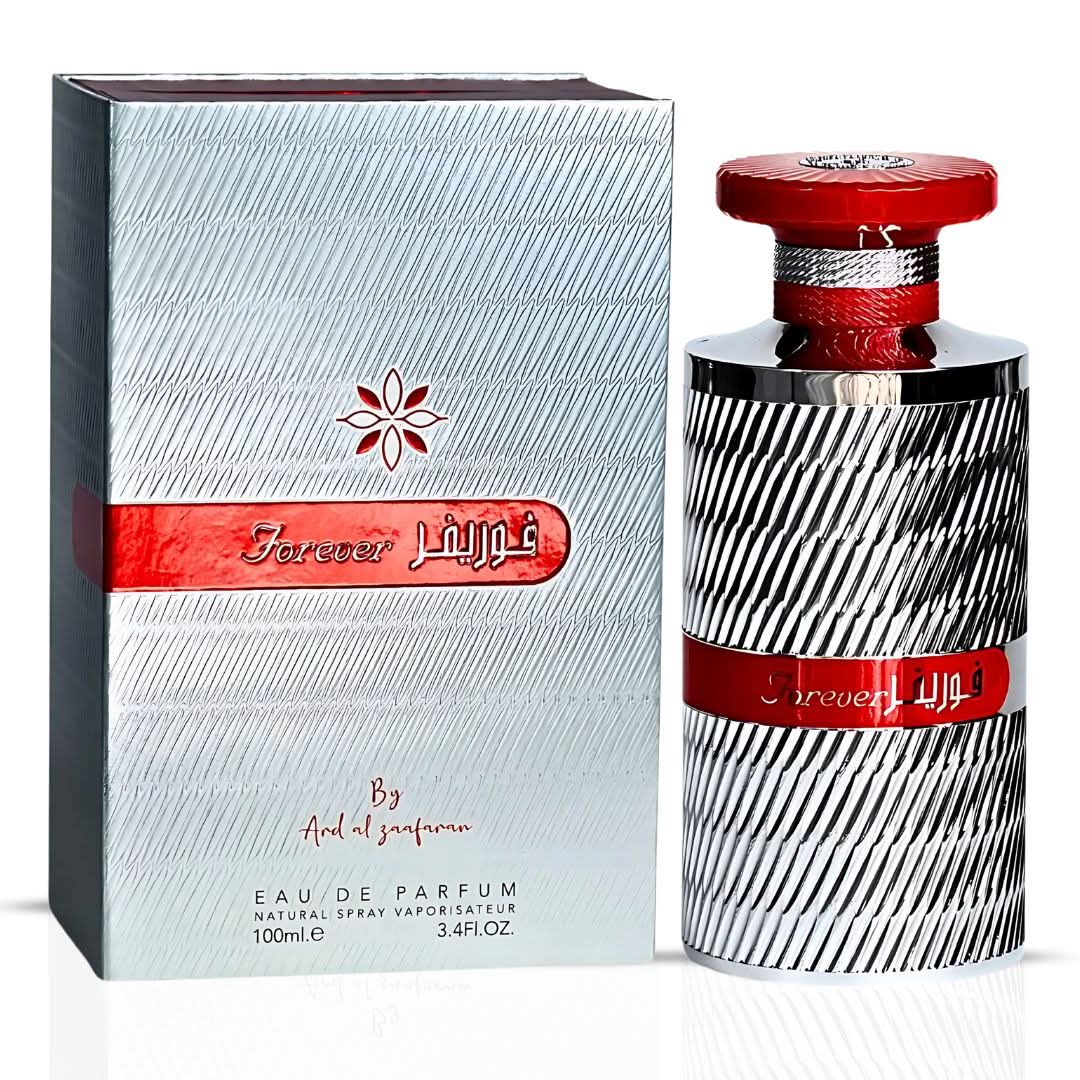 Bundle of Ard Al Zaafaran Pink Blush Shams Al Emarat and Forever Silver Eau de Parfum sprays, 100ml each, with floral and silver accents.