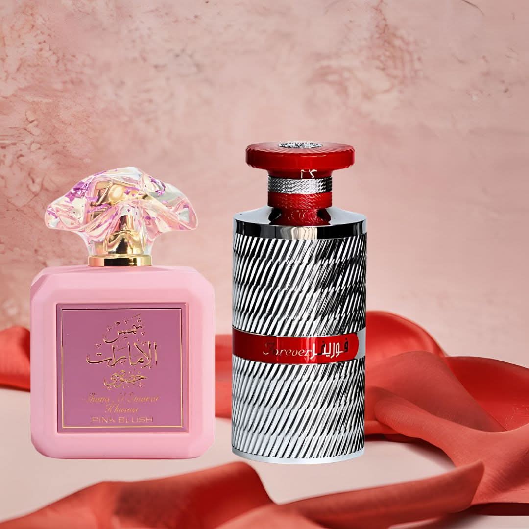 Bundle of Ard Al Zaafaran Pink Blush Shams Al Emarat and Forever Silver Eau de Parfum sprays, 100ml bottles, with floral and silver accents.