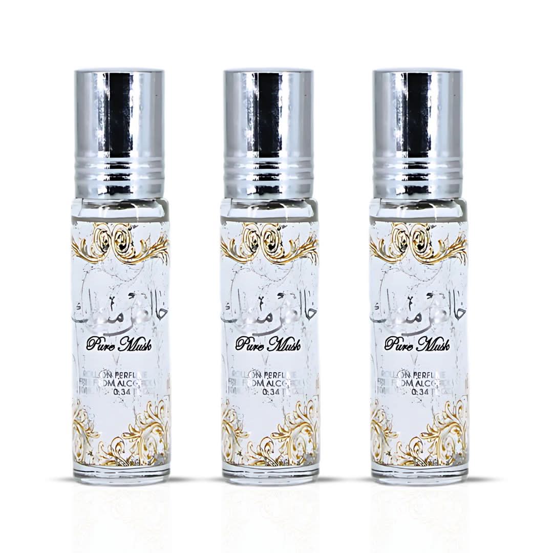 Three 10ml bottles of Ard Al Zaafaran Pure Musk Perfume Oil in clear glass bottles with black caps.