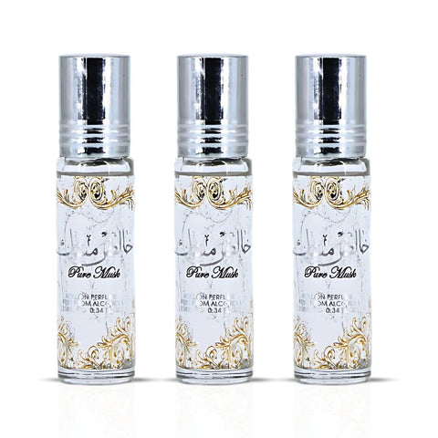 Three 10ml bottles of Ard Al Zaafaran Pure Musk Perfume Oil in clear glass bottles with black caps.