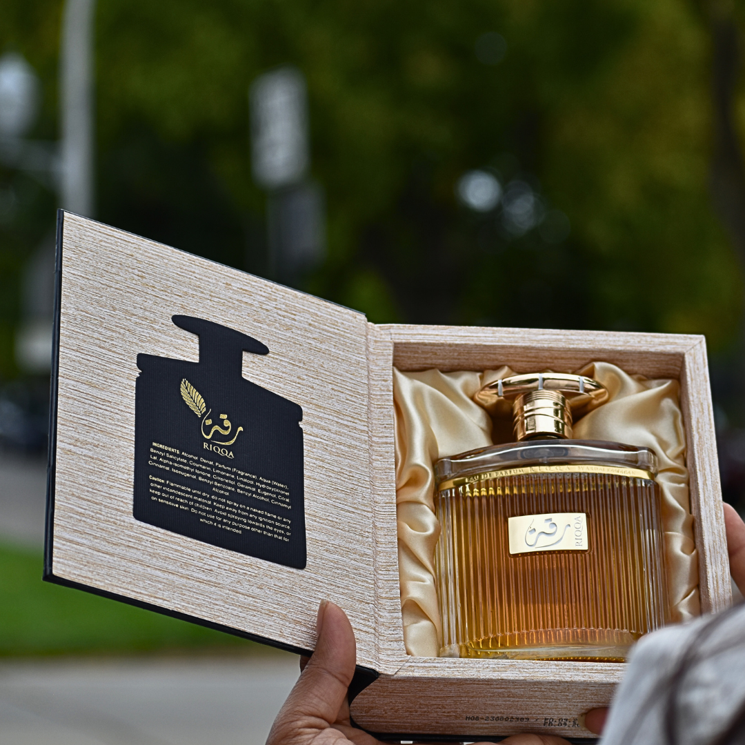 Close-up of Ard Al Zaafaran Riqqa Eau de Parfum Spray bottle with detailed cap, 100ml size, showcasing the elegant design.