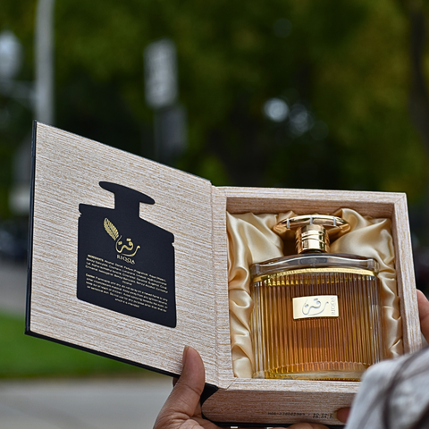 Close-up of Ard Al Zaafaran Riqqa Eau de Parfum Spray bottle with detailed cap, 100ml size, showcasing the elegant design.