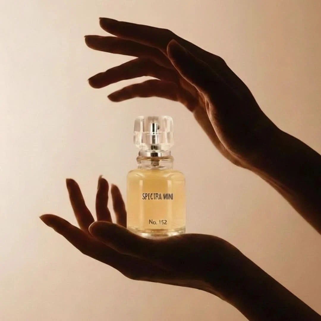 Spectra Mini No. 152 Eau De Parfum spray bottle, 25ml, with elegant packaging and fragrance details visible.