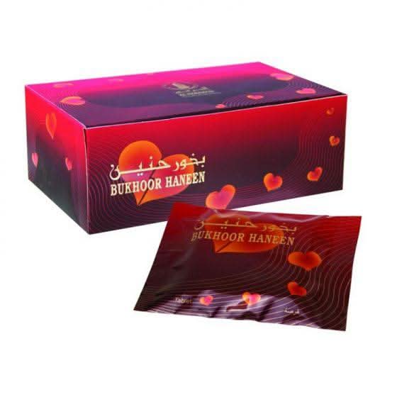 Al Haramain Haneen Bakhoor Tablet 45g with Arabic calligraphy design, used for traditional incense burning.