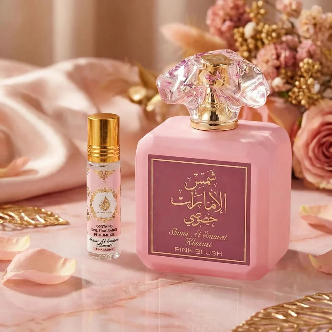 Bundle of Ard Al Zaafaran Pink Blush Shams Al Emarat Eau de Parfum spray and roll-on perfume oil, featuring floral pink fragrance bottles.