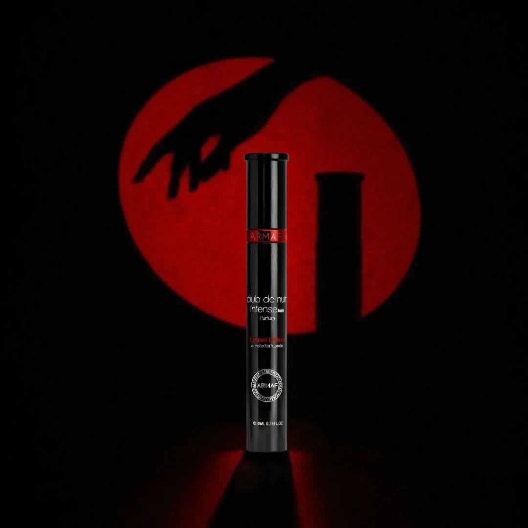 Armaf Club De Nuit Limited Edition Eau de Parfum spray 10ml bottle, sleek black packaging with silver accents, elegant and compact design.