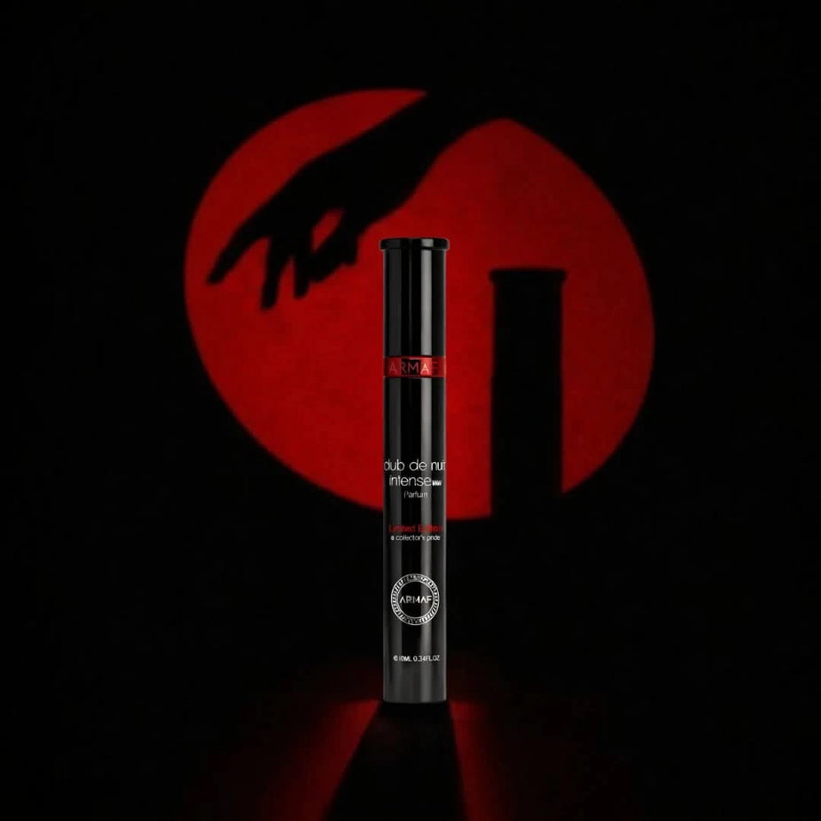 Armaf Club De Nuit Limited Edition Eau de Parfum spray 10ml, sleek bottle with dark accents, showcasing the luxury fragrance.