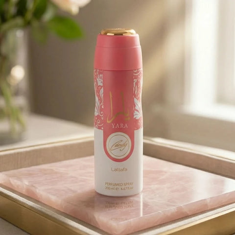 Lattafa Yara Candy deodorant spray 200ml bottle with pink and white design, featuring floral and candy-themed graphics.