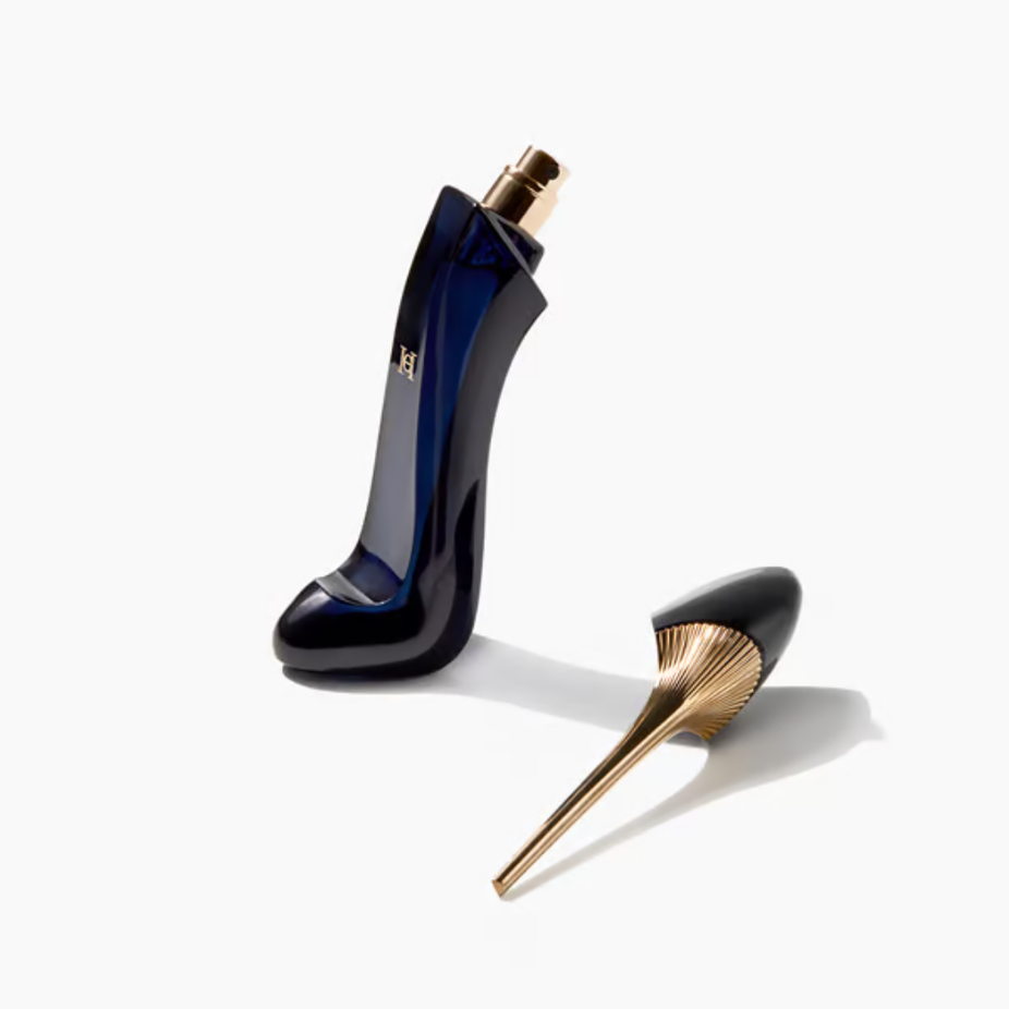 Carolina Herrera Good Girl Eau De Parfum 80ml bottle with a sleek design and dark-colored cap, displayed on a cold background