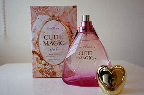 Velvet pouch containing 100ML Cutie Magic Girl EDT by Alta Moda, elegant bottle with floral design and soft velvet packaging.