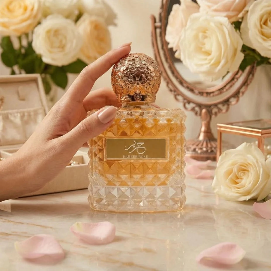 Aura by Aura Hareer Rose Eau De Parfum spray 100ml bottle with elegant floral design on the packaging.