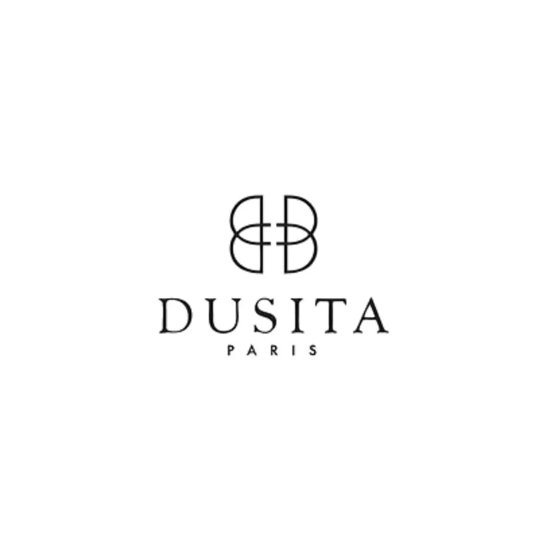 Dusita Paris La Rhapsodie Noire Eau de Parfum 100ml bottle with elegant black and gold design on a white background.