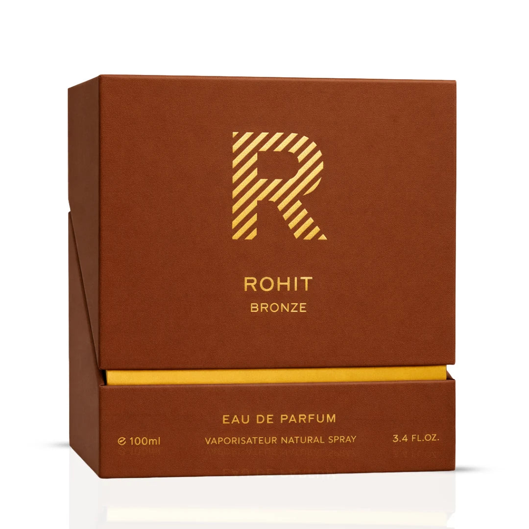 Rohit Bronze Eau de Parfum spray by Bharara, 100ml bottle, elegant bronze-colored perfume bottle with a sleek design.