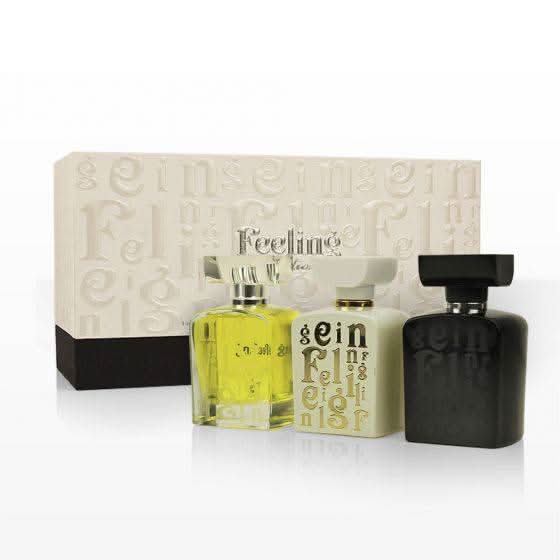 Arabian Oud Feeling Collection Perfume Gift Set with three 100ml bottles, elegant packaging and luxurious fragrance display.
