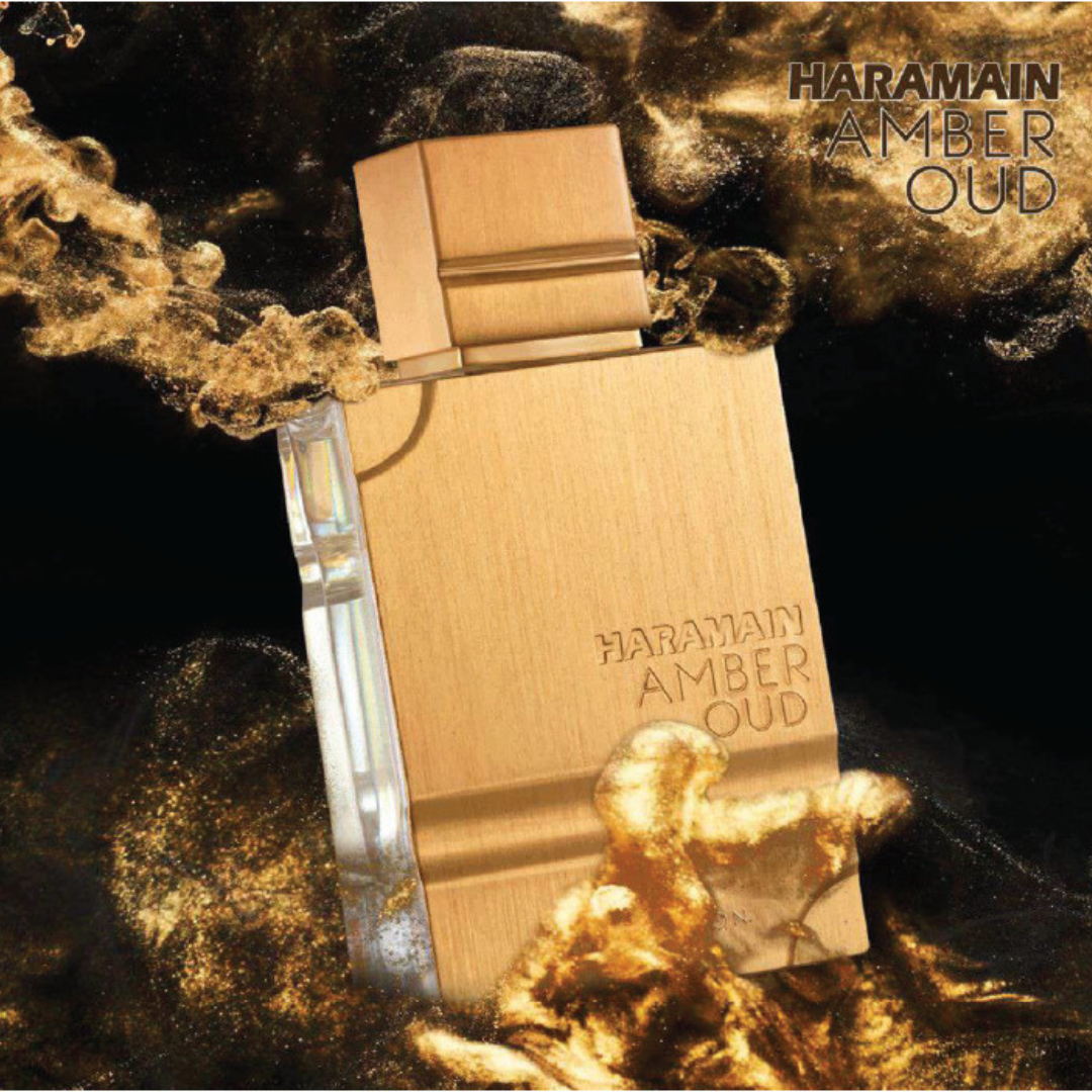 Al Haramain Amber Oud Gold Edition Eau de Parfum spray in a gold bottle, 100ml, with a velvet pouch visible in the image.