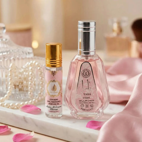 Ard Al Zaafaran perfume bundle featuring Yara Eau de Parfum spray and Pink Blush roll-on perfume oil, both with elegant bottles.