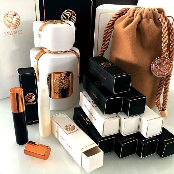 Tamuh Unisex Eau De Parfum by Sawalef in 80ml bottle, elegant perfume bottle with a sleek design and cap.