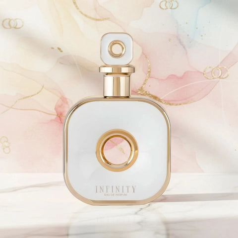 Infinity Gold Eau de Parfum spray by Armaf, 105ml bottle, with gold accents and elegant perfume bottle design.