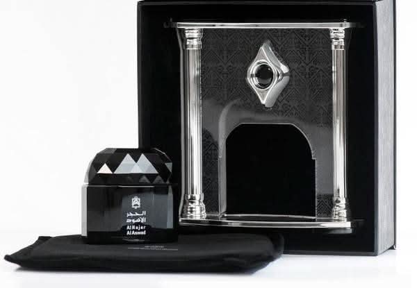 Al Hajar Al Aswad perfume oil by Abdul Samad Al Qurashi, 30ml CPO concentrated perfume oil in a glass bottle with a black cap.