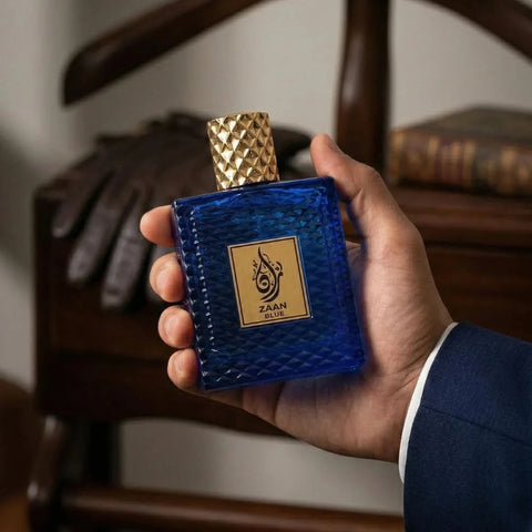 Aura Fragrances Zaan Blue Eau De Parfum spray in a 100ml bottle, showcasing the sleek blue packaging and elegant design.