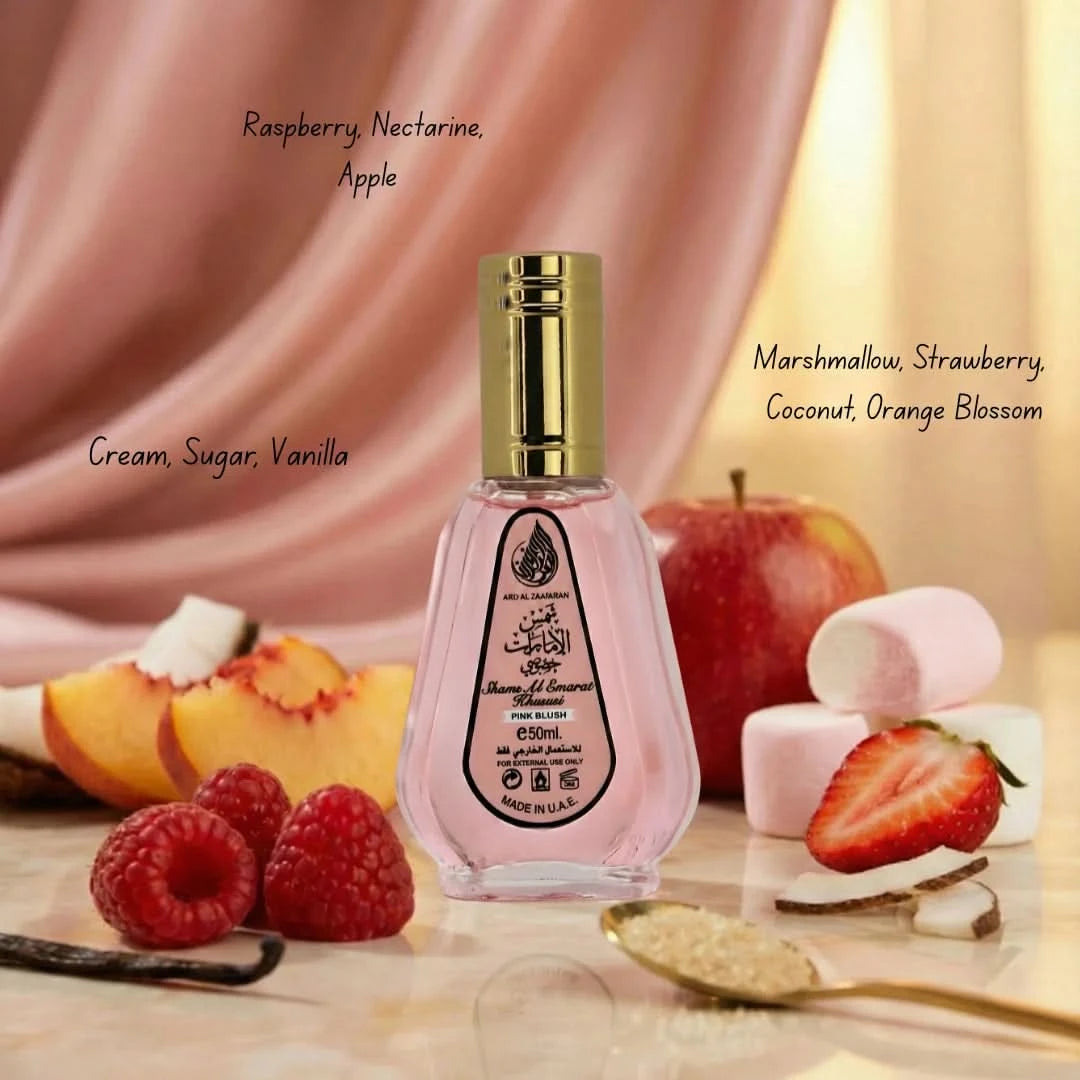 Ard Al Zaafaran Pink Blush Shams Al Emarat perfume oil and Eau de Parfum spray bundle with pink and gold packaging.