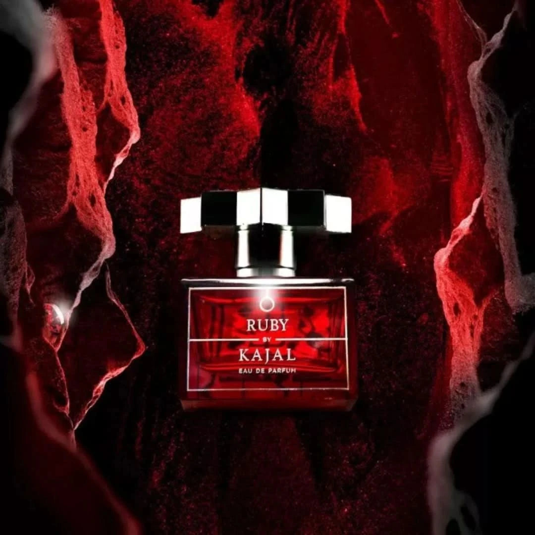 Kajal Ruby Eau de Parfum Spray 100ml bottle, elegant glass container with a gold cap and ruby red accents.